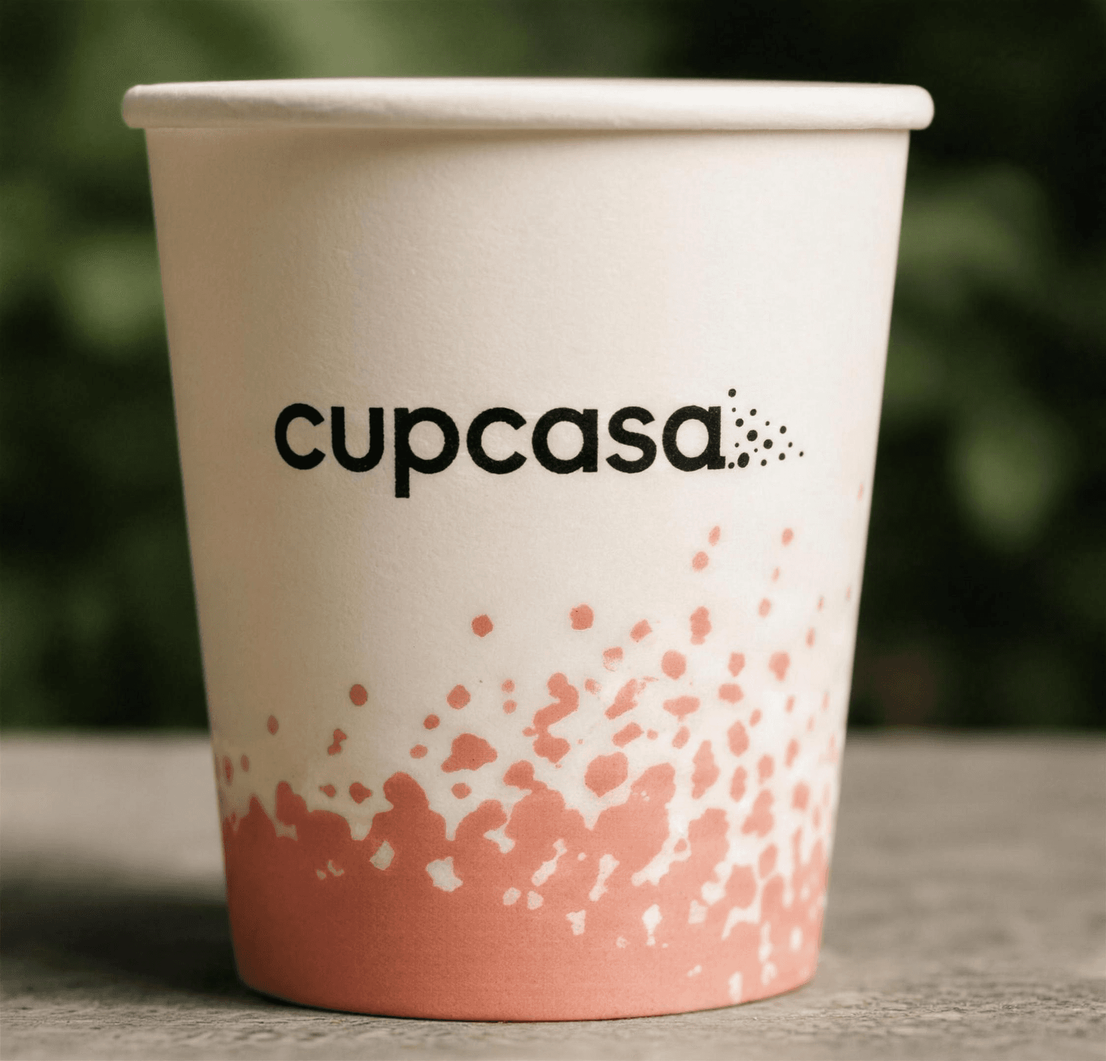 A cream cupcasa cup with the coral dissolve print